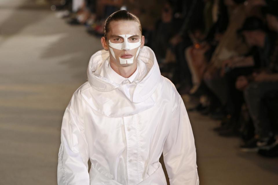 A model presents a creation as part of the Givenchy men's fashion Spring-Summer 2014 collection, presented Friday, June 28, 2013 in Paris. (AP Photo/Francois Mori)