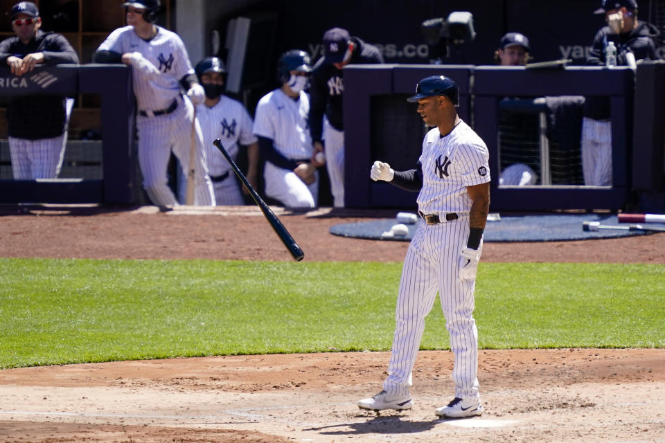 New York Yankees' Aaron Hicks flips his bat as he strikes out against Detroit Tigers starting pitcher Spencer Turnbull with bases loaded in the third inning of a baseball game, Saturday, May 1, 2021, in New York. (AP Photo/John Minchillo)