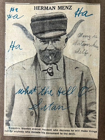 An annotated newspaper photo of Herman Menz, portraying him as the devil, was sent to Menz during the controversy.