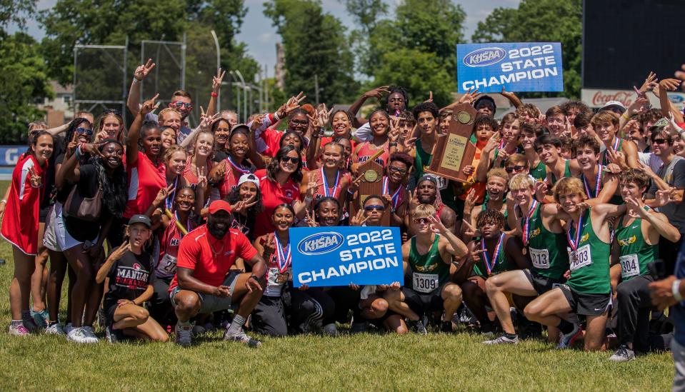 St. Xavier men's team and Manual women's team celebrate winning state championships at the KHSAA Class 3A State Track Meet in Lexington, Kentucky on June 4, 2022. This is St. Xavier's third consecutive state championship and Manual second straight title.