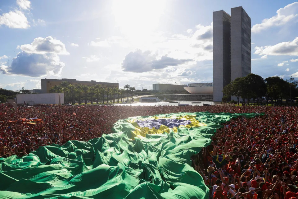 Supporters of Luiz Inacio Lula da Silva gather on the day he is sworn in as Brazil&#39;s President, in Brasilia, Brazil, January 1, 2023. REUTERS/Adriano Machado