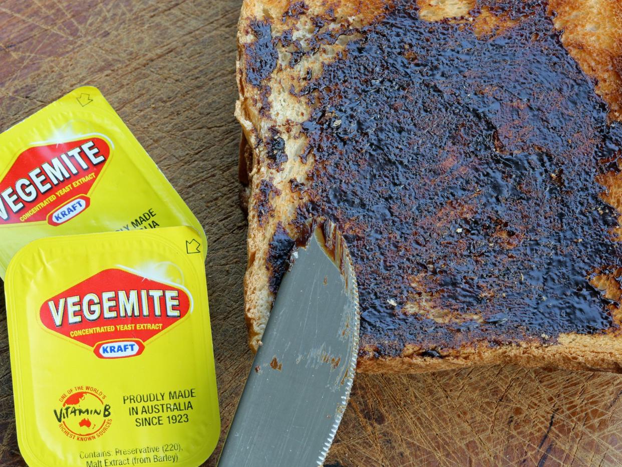 Vegemite on Toast-Produce in Australia at Kraft Foods' Port Melbourne. It's a popular dark brown australian Food Paste-used as spread for sandwiches and toast-the Australian People love it for Breakfast.
