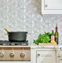 <p>"Expect interesting backsplashes that have texture and dimension. Subway tiles are classic, but people now want more unique tiles that provide a variation to the usual." — <a href="https://www.instagram.com/georgiazikasdesign/?hl=en" rel="nofollow noopener" target="_blank" data-ylk="slk:Georgia Zikas, Georgia Zikas Design;elm:context_link;itc:0;sec:content-canvas" class="link "><strong><em>Georgia Zikas, Georgia Zikas Design</em></strong></a></p>