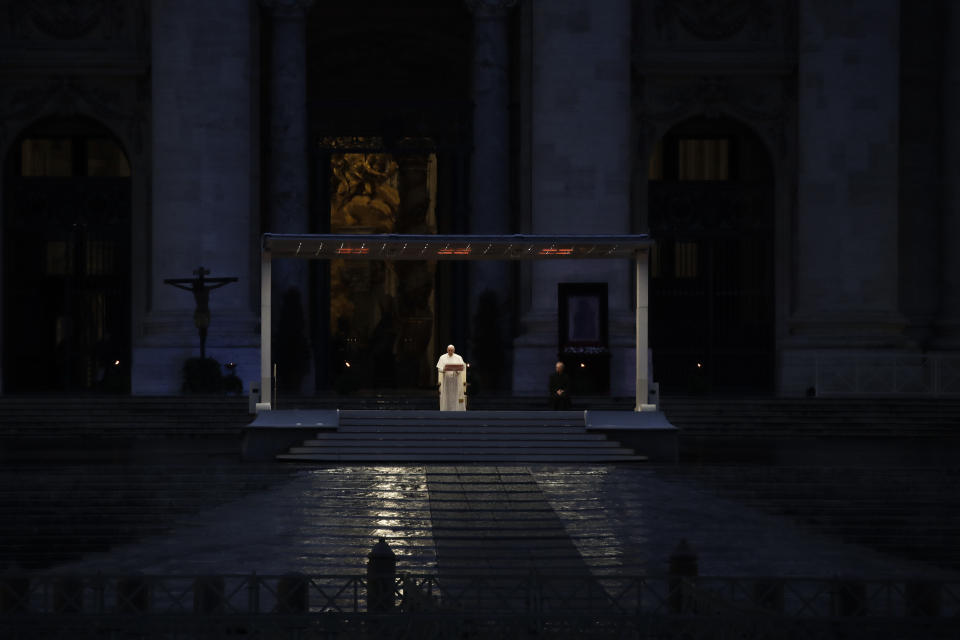 Pope Francis delivers the Urbi and Orbi prayer (Latin for To the City and To the World) in an empty St. Peter's Square, at the Vatican, Friday, March 27, 2020. Praying in a desolately empty St. Peter's Square, Pope Francis on Friday likened the coronavirus pandemic to a storm laying bare illusions that people can be self-sufficient and instead finds "all of us fragile and disoriented" and needing each other's help and comfort. The new coronavirus causes mild or moderate symptoms for most people, but for some, especially older adults and people with existing health problems, it can cause more severe illness or death. (AP Photo/Alessandra Tarantino)