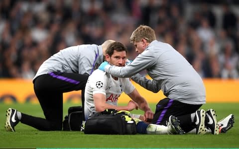 The game was paused for a number of minutes as he received treatment on the pitch - Credit: Getty Images