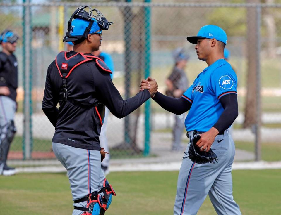 Miami Marlins catcher Christian Bethancourt and left-handed pitcher Jesus Luzardo after Luzardo’s bullpen session during Miami Marlins pitchers and catchers spring training workout at Roger Dean Chevrolet Stadium in Jupiter, Florida on Thursday, February 15, 2024.