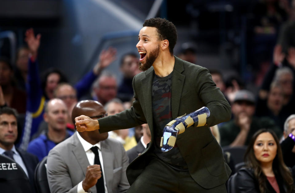 Stephen Curry and the Warriors might have different feelings about his return. (Ezra Shaw/Getty Images)