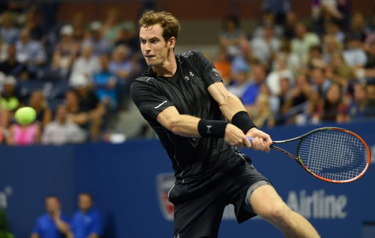 Andy Murray hits a return to Nick Kyrgios during their US Open match at the USTA Billie Jean King National Center on September 1, 2015