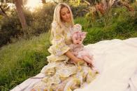 <p>Camraface</p> Paris Hilton and daughter London.