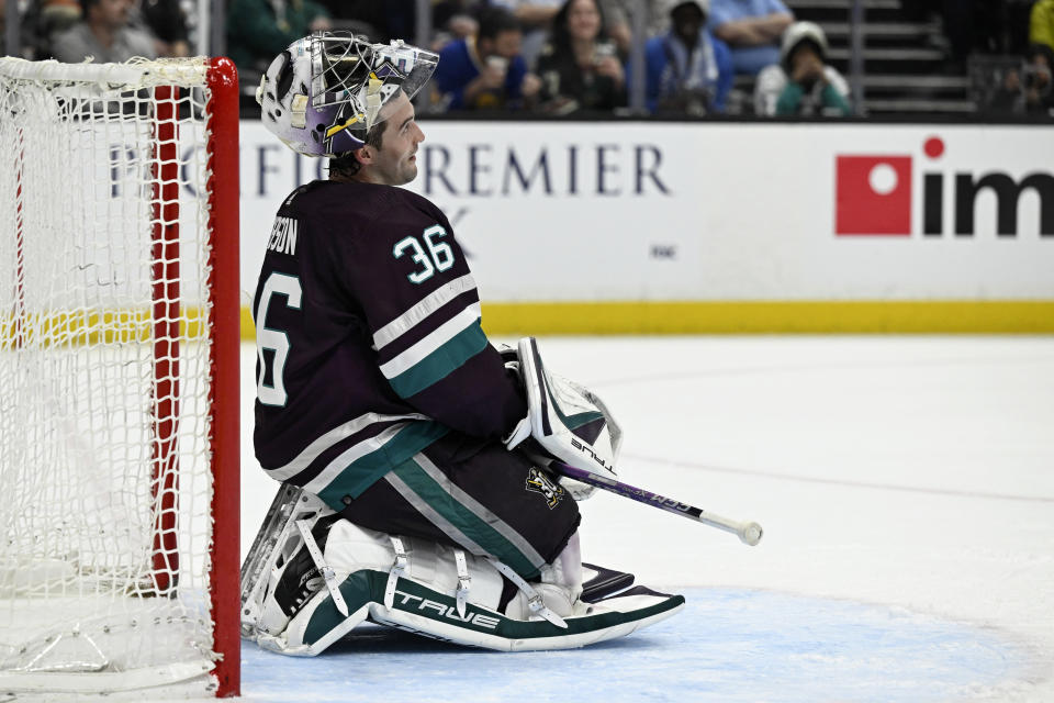 Anaheim Ducks goaltender John Gibson watches the video scoreboard after the Minnesota Wild scored during the second period of an NHL hockey game in Anaheim, Calif., Tuesday, March 19, 2024. (AP Photo/Alex Gallardo)