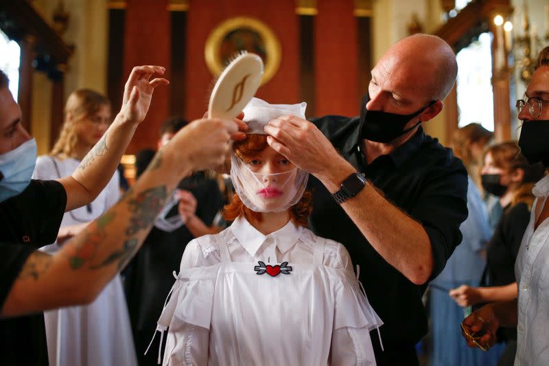 Models prepare backstage of the Bora Aksu catwalk show at London Fashion Week 2020, in London