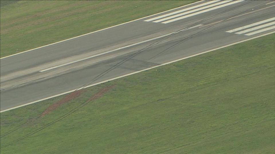 Tire marks left behind after an American Airlines plane veered off the runway Thursday at CLT. No injuries were reported.