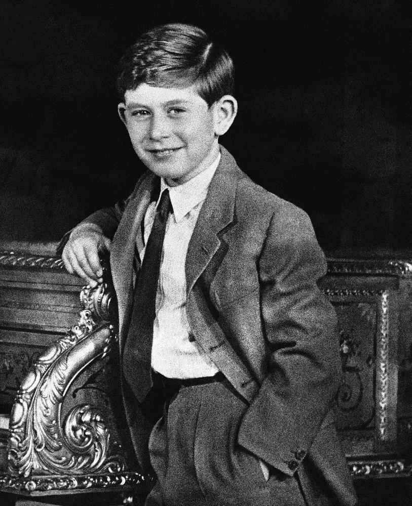 FILE - In this Nov. 13, 1947 file photo, Britain's Prince Charles poses at Buckingham Palace, in London. Prince Charles is readying the paperwork to claim his pension when he turns 65 on Thursday, Nov. 14, 2013, but he still hasn't started the job he was born to do. (AP Photo, File, Pool)