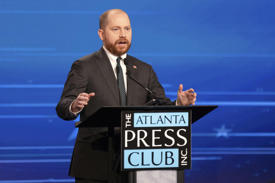 Charlie Bailey, Democratic candidate for Lieutenant Governor of Georgia, participate in the Atlanta Press Club Loudermilk-Young Debate Series with Libertarian Ryan Graham and Republican state Sen. Burt Jones, Tuesday, Oct. 18, 2022, in Atlanta. (Dustin Chambers/Pool Photo via AP)