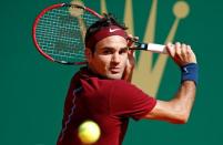 Tennis - Monte Carlo Masters - Monaco, 15/04/2016. Roger Federer of Switzerland plays a shot to Jo-Wilfried Tsonga of France . REUTERS/Eric Gaillard