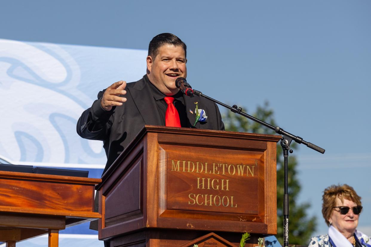 Todd Angilly addresses students and guests as the guest speaker. The class of 2024 had one last moment under the sun as Middletown High School students during Saturday's graduation ceremony on Gaudet Field.