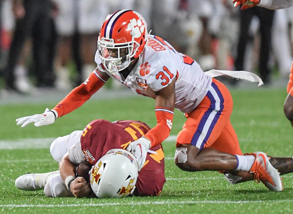 Clemson corner back Mario Goodrich (31) forced a fumble by Iowa State quarterback Brock Purdy during the fourth quarter of the 2021 Cheez-It Bowl at Camping World Stadium in Orlando, Florida Wednesday, December 29, 2021. 