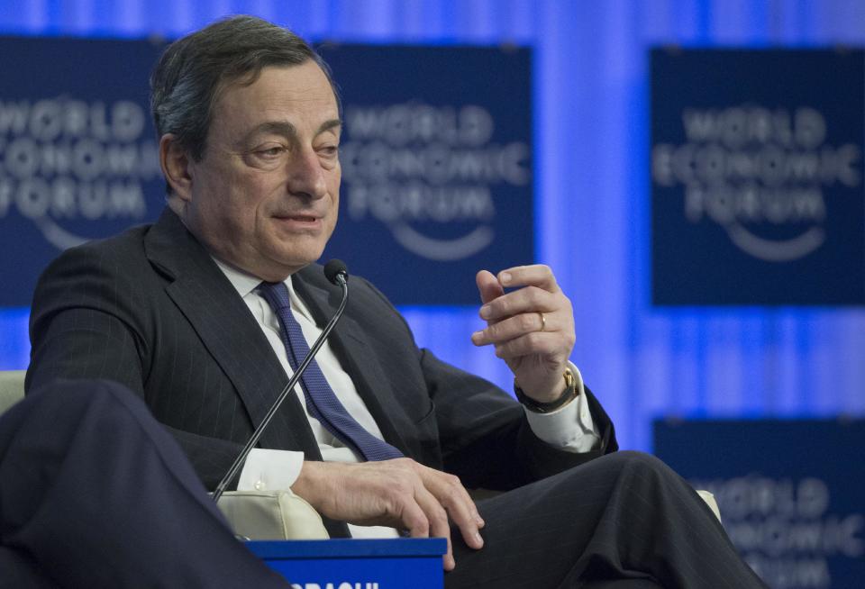 Mario Draghi, President of the European Central Bank, speaks during a session of the World Economic Forum in Davos, Switzerland, Friday, Jan. 24, 2014. (AP Photo/Michel Euler)