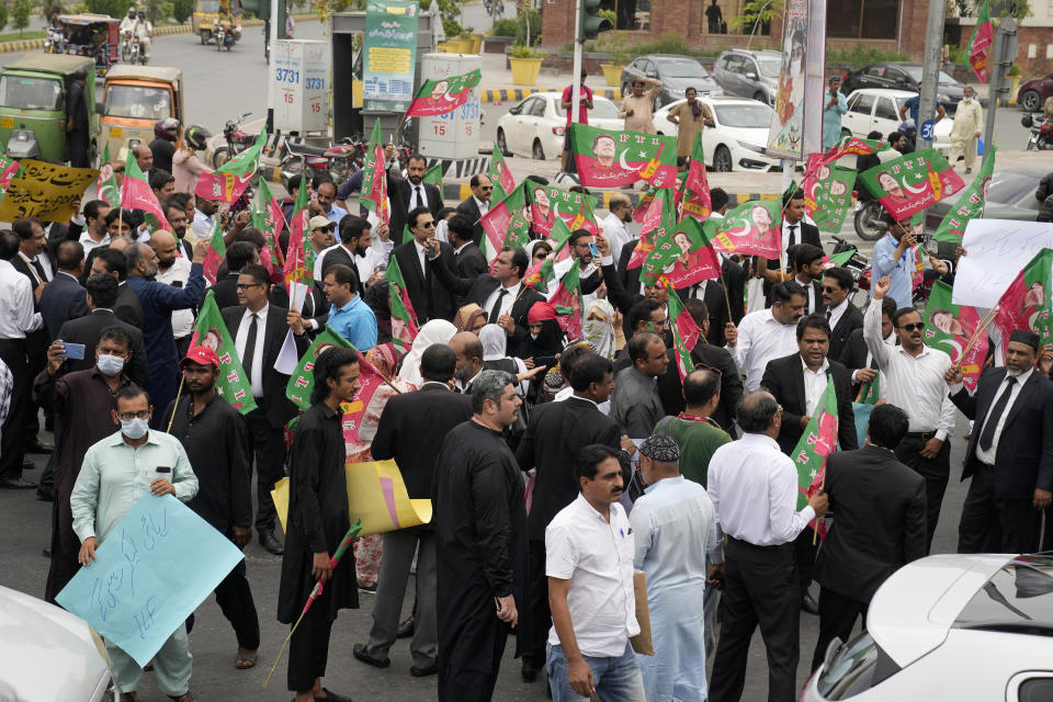 Lawyers, who support Pakistan's former Prime Minister Imran Khan, hold a protest against Khan's imprisonment, in Lahore, Pakistan, Monday, Aug. 7, 2023. Khan is now an inmate at a high-security prison after being convicted of corruption and sentenced to three years. (AP Photo/K.M. Chaudary)