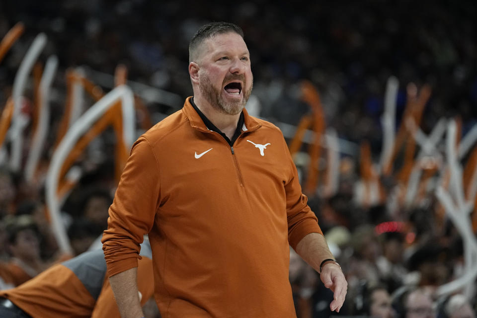 Texas head coach Chris Beard talks to his players during the first half of an NCAA college basketball game against Creighton in Austin, Texas, Thursday, Dec. 1, 2022. (AP Photo/Eric Gay)