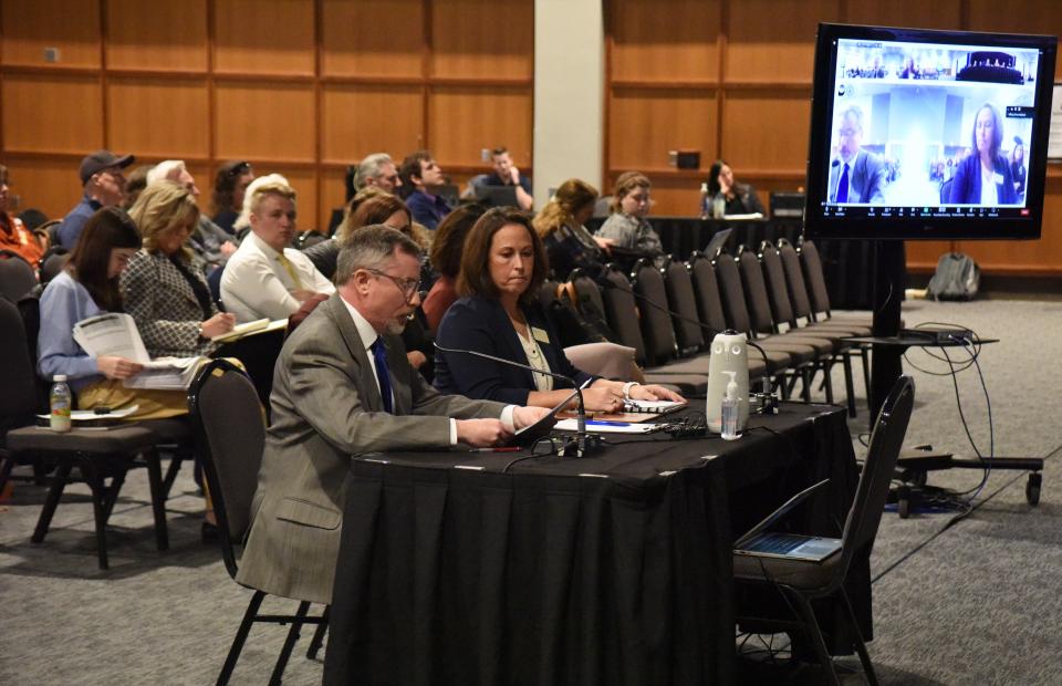 Ben Jones, state historian, and Shannon Malone with the Department of Education speak in support of the proposed social studies standards during a Board of Education Standards meeting at the Sioux Falls Convention Center on Nov. 21, 2022.