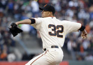 San Francisco Giants starting pitcher Ryan Vogelsong throws to the Los Angeles Dodgers during the first inning of a baseball game Wednesday, April 16, 2014, in San Francisco. (AP Photo/Marcio Jose Sanchez)