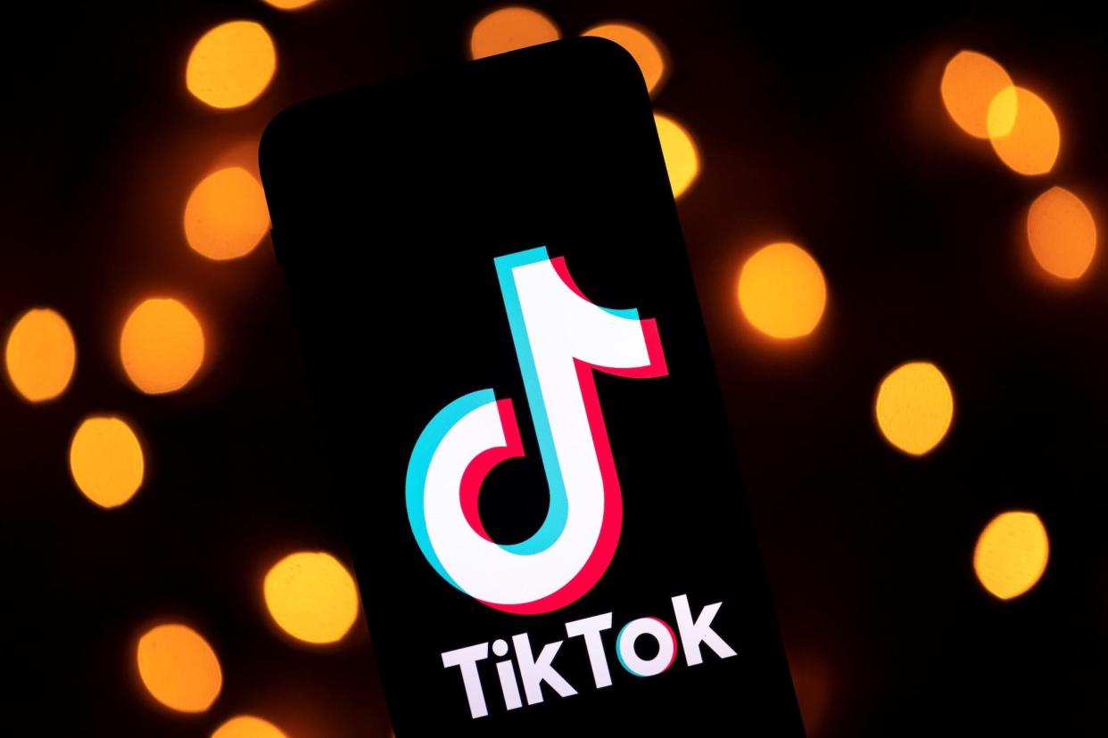 This photo taken on November 21, 2019, shows the logo of the social media video sharing app Tiktok displayed on a tablet screen in Paris: LIONEL BONAVENTURE/AFP via Getty Images