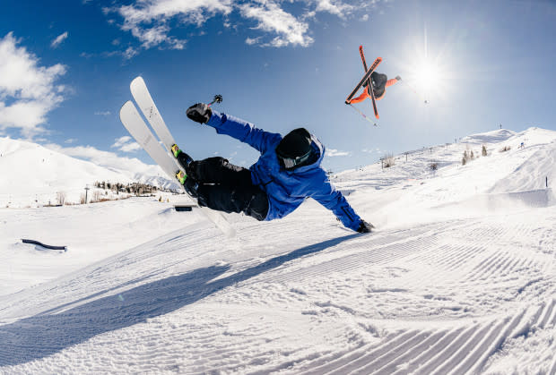 Masters of timing. Wing Tai Barrymore hand drags the knuckle while Collin Collins spins a stylish 7 off the lip. Sun Valley, Idaho.<p>Photo: Tal Roberts</p>