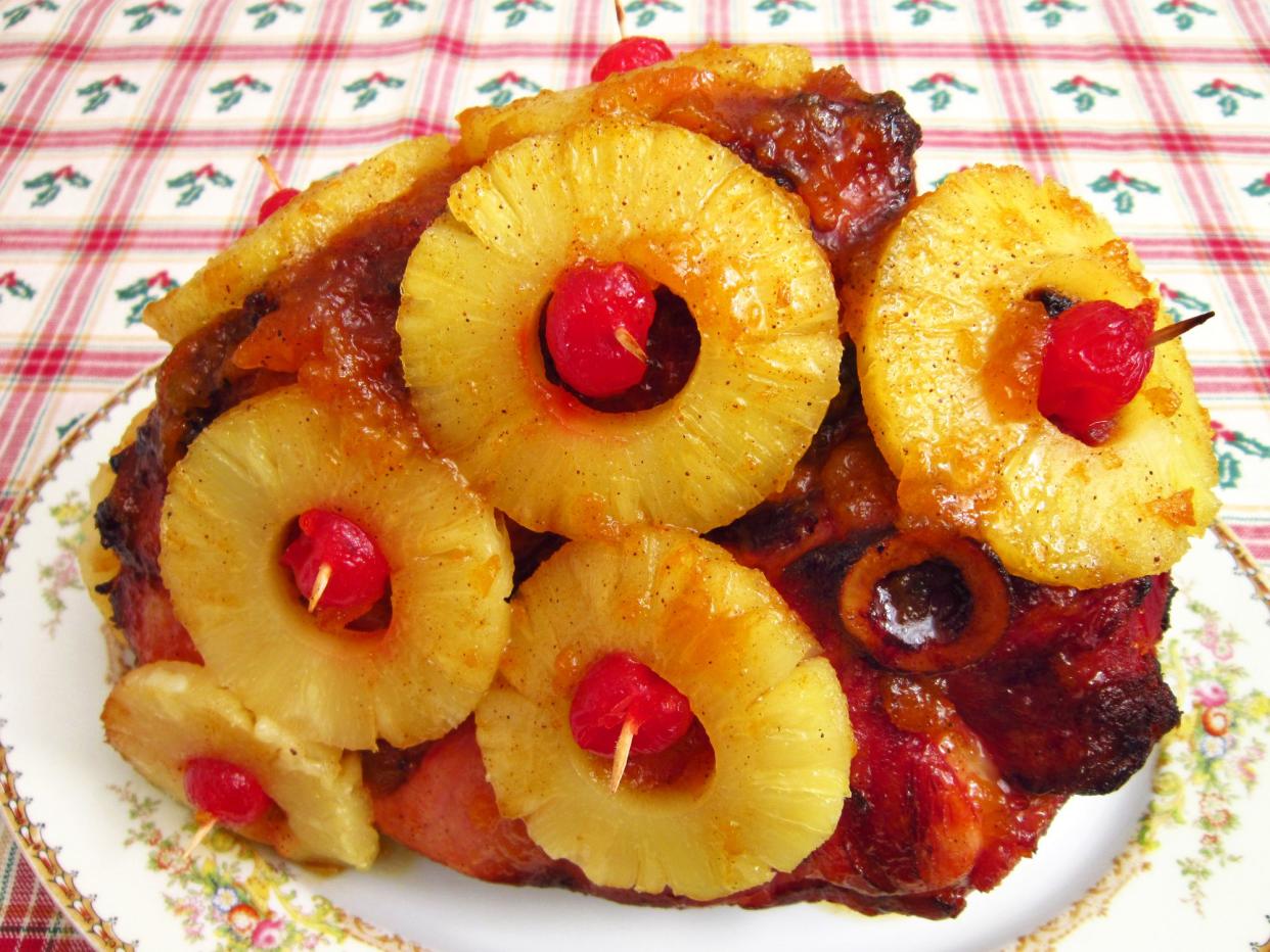 Photo of ham with cherries and pineapples prepared for new years eve dinner.