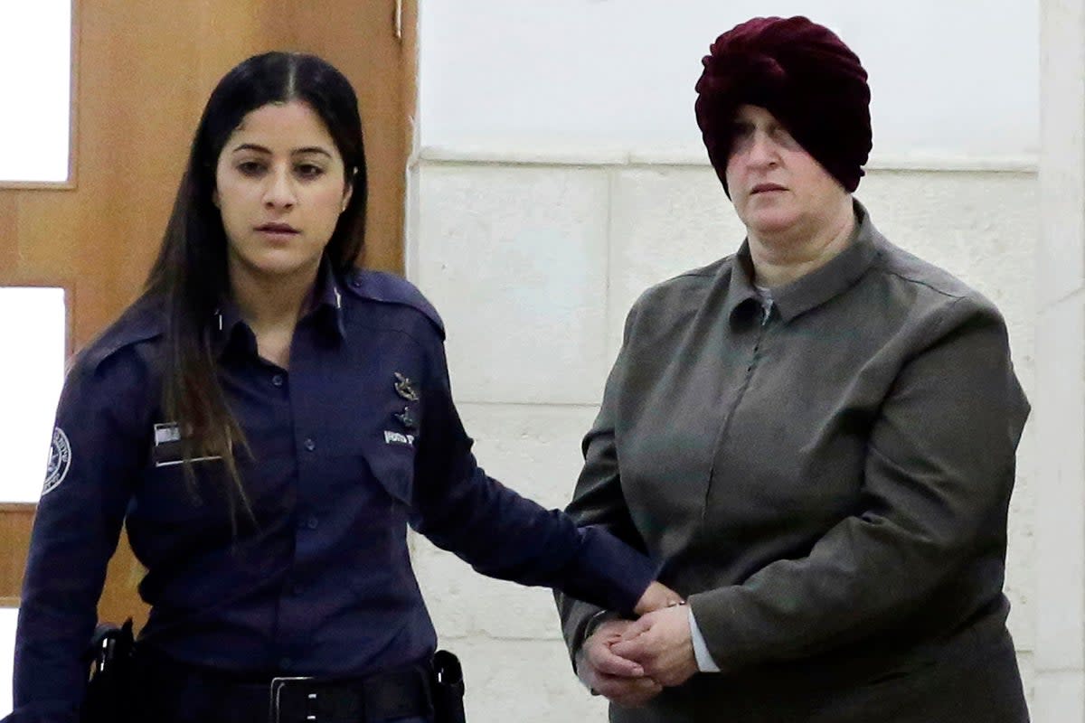 File  Israeli-born Australian Malka Leifer, right, is brought to a courtroom in Jerusalem in 2018 (AP)