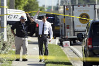 <p>Officials investigate the scene of a deadly shooting outside of the Club Blu nightclub, Monday, July 25, 2016, in Fort Myers, Fla. (AP Photo/Lynne Sladky)</p>