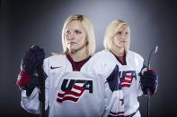 Olympic ice hockey players Jocelyne Lamoureux (L) and Monique Lamoureux pose for a portrait during the 2013 U.S. Olympic Team Media Summit in Park City, Utah October 2, 2013. REUTERS/Lucas Jackson (UNITED STATES - Tags: SPORT OLYMPICS PORTRAIT ICE HOCKEY)