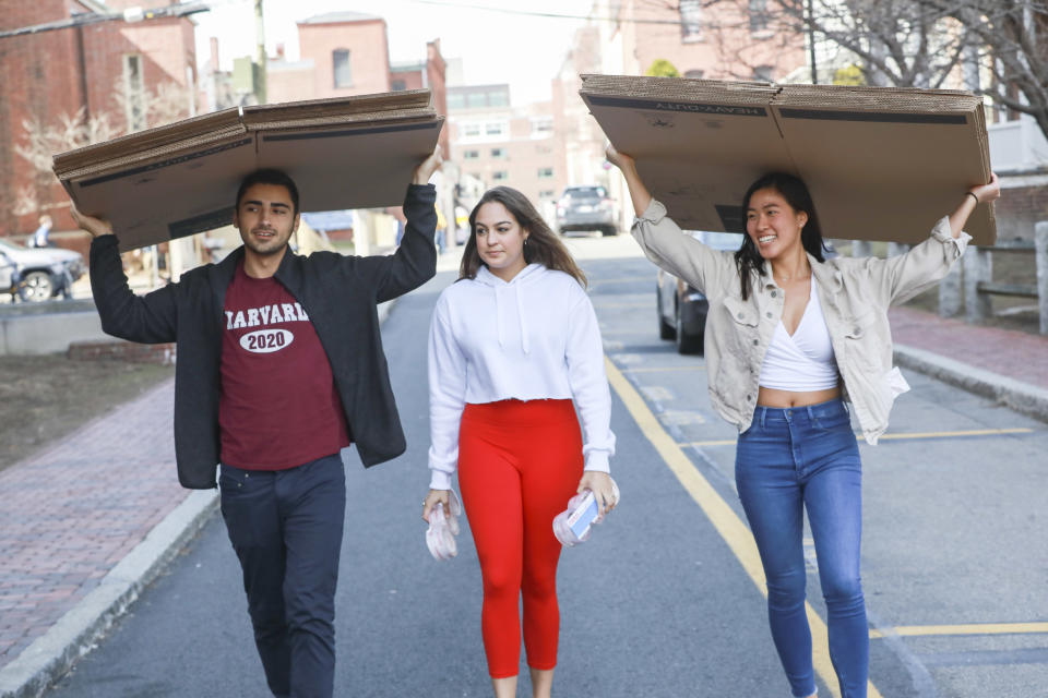 CAMBRIDGE, MA: March 10, 2020: Anthony O'Neil, Christian Cruz and Annie Wang prepare to pack as Harvard University announced it will close down their campus early this semester, asking students to vacate by March 15th over the Coronavirus, in Cambridge, Massachusetts. (Staff photo by Nicolaus Czarnecki/MediaNews Group/Boston Herald)