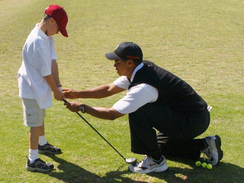 tiger woods charity kid