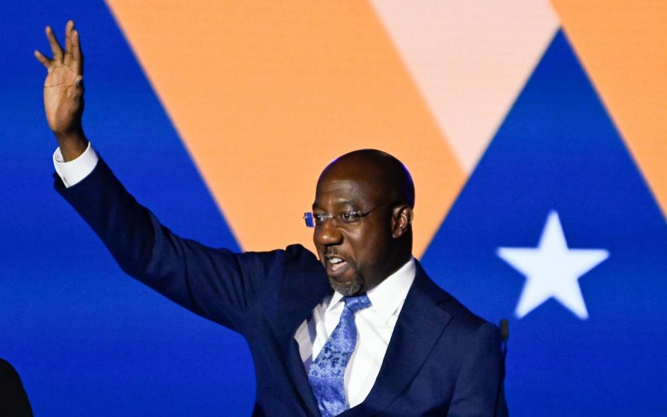 US Senator Raphael Warnock thanks supporters for being at his election night party in Atlanta - JOHN AMIS/EPA-EFE/Shutterstock 