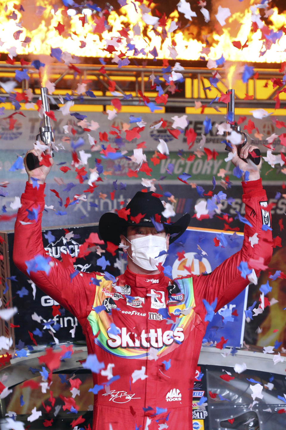 Kyle Busch celebrates in Victory Lane after winning the NASCAR Cup Series auto race at Texas Motor Speedway in Fort Worth, Texas, Wednesday, Oct. 28, 2020. (AP Photo/Richard W. Rodriguez)