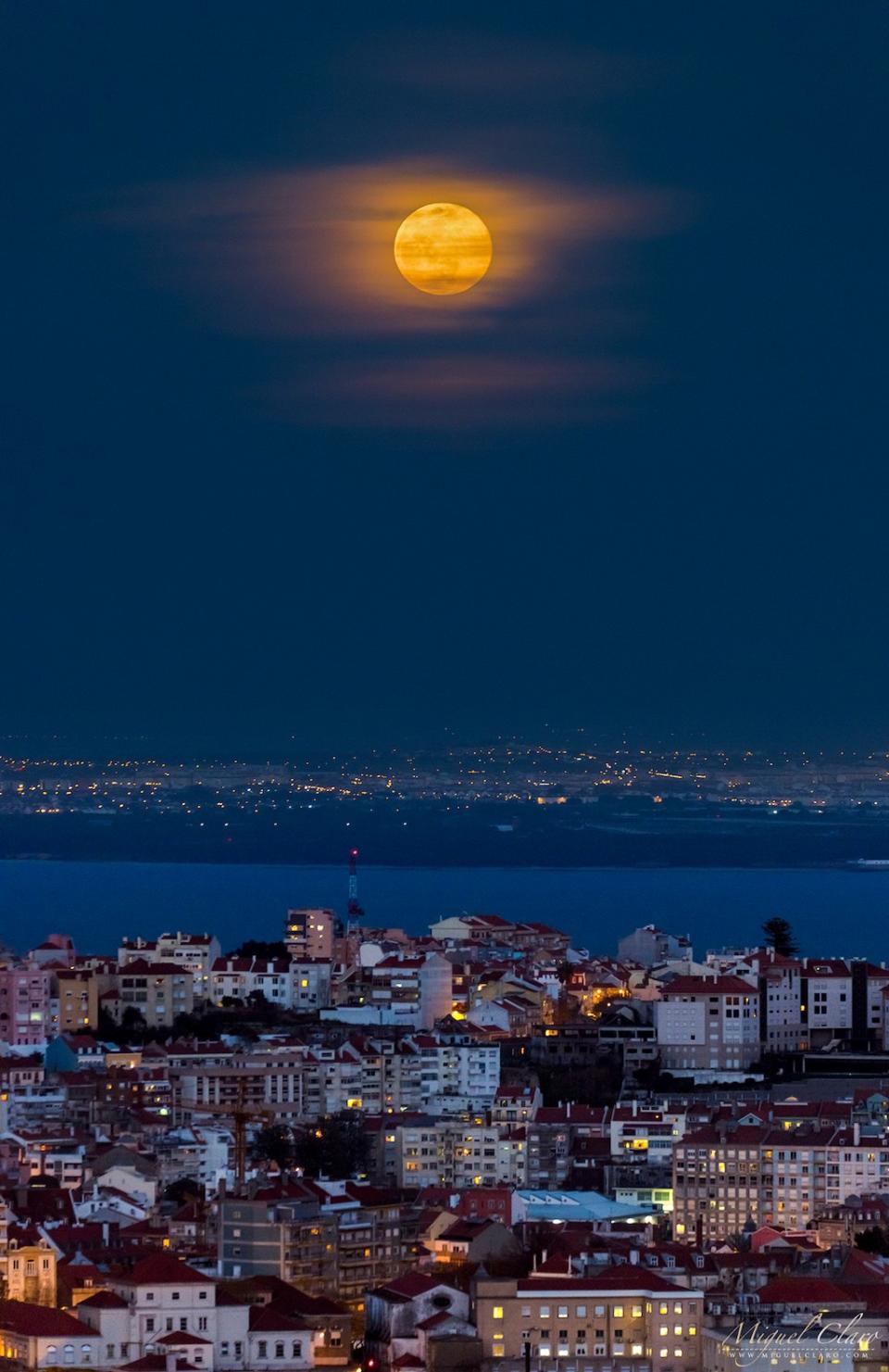 golden-blue-moon-gleams-over-lisbon-photo