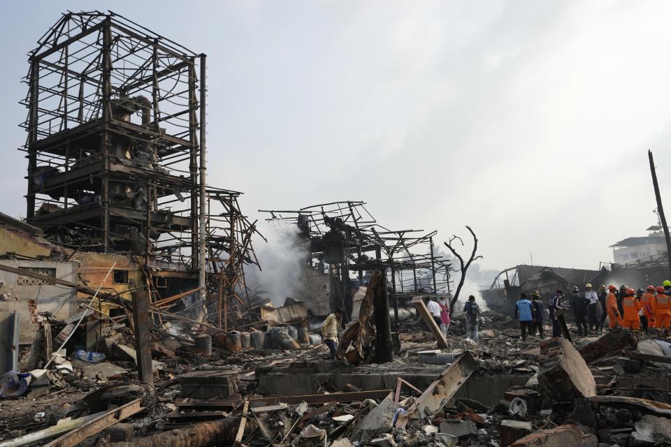 National Disaster Response Force rescuers work at the site after an explosion and fire at a chemical factory in Dombivali near Mumbai, India, Friday, May 24, 2024. Multiple people were killed and dozens were injured in the incident that happened Thursday. (AP Photo/Rajanish Kakade)
