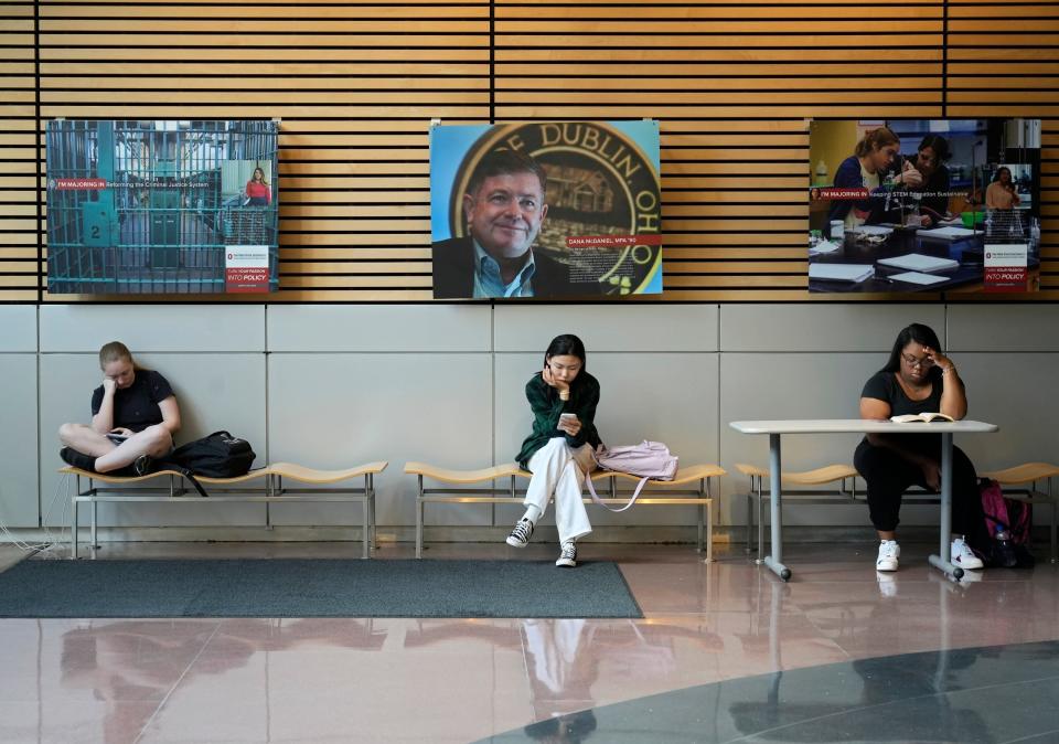 In this Dispatch file photo, waiting for a class to start in the John Glenn College of Public Affairs building on the Ohio State University campus are, from left, Jillian Matejka, of Westerville, Meishan Han, of China, and Haitia Bell, of the Southeast Side.