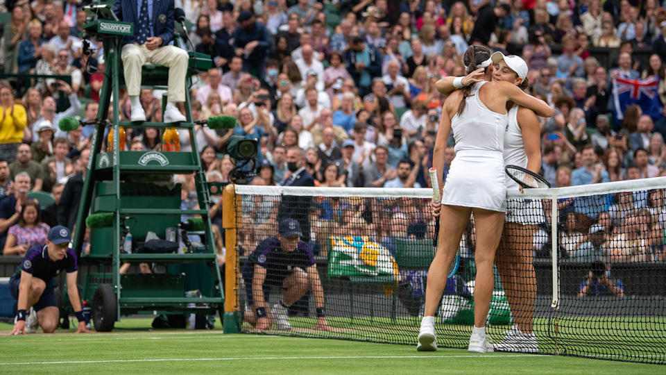 Ash Barty and Ajla Tomljanovic, pictured here embracing after their quarter-final clash at Wimbledon.