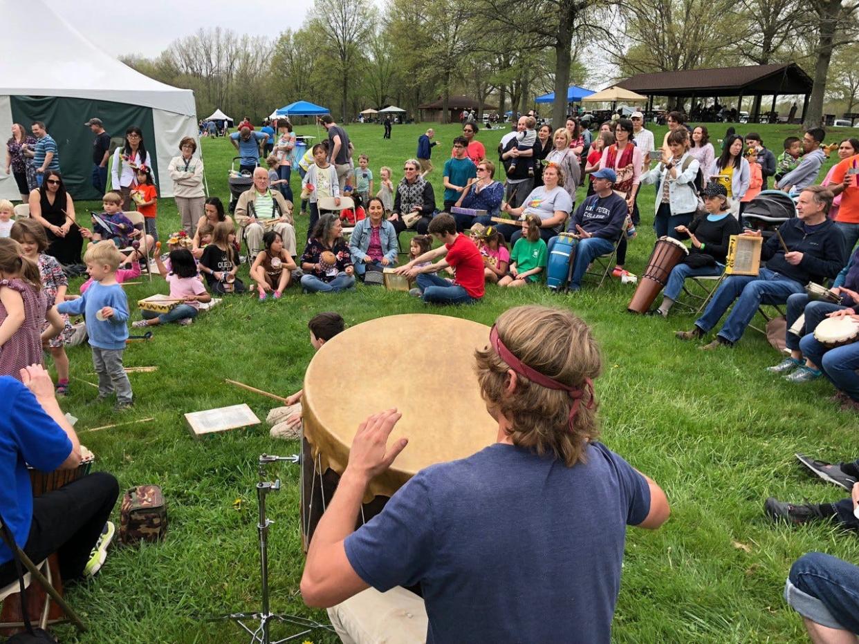 A crowd gathers to watch a drum circle during the 2018 Columbus Folk Music Festival. This year's festival will be held May 7 and 8 at Highbanks Metro Park, 9466 Columbus Pike (U.S. Route 23).