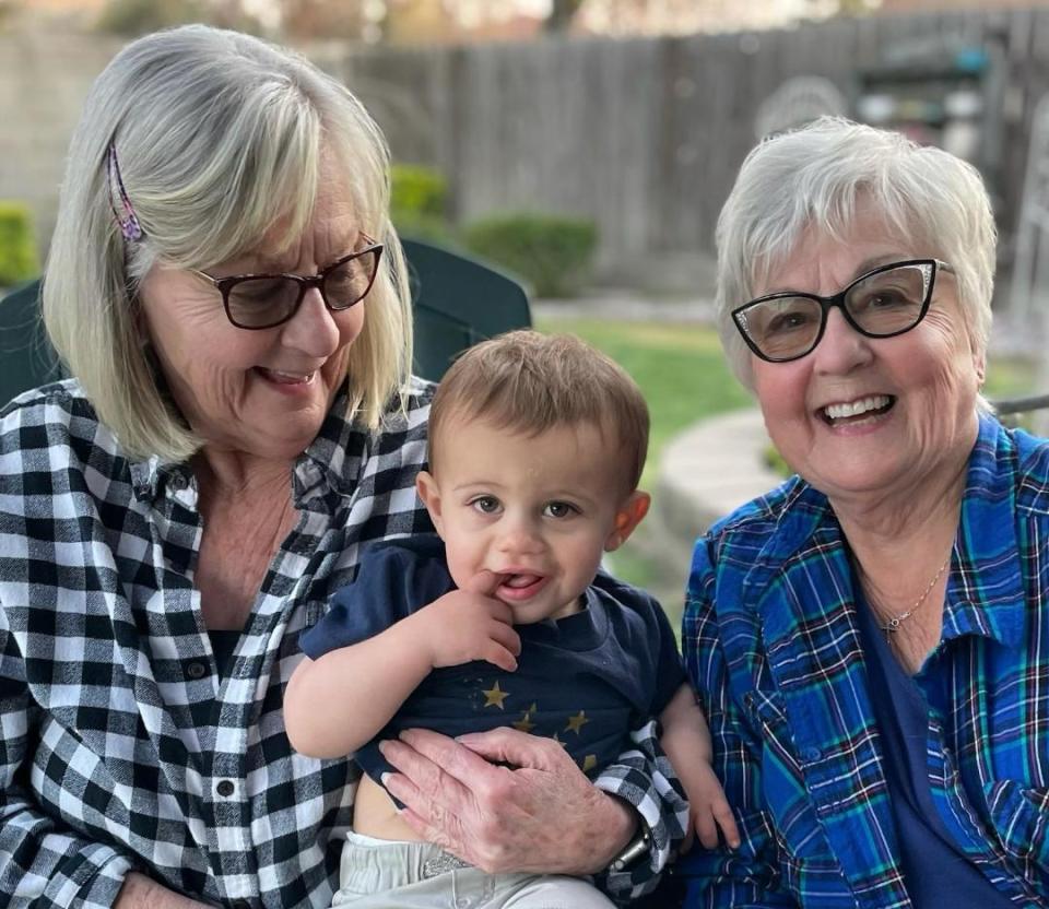 Jackie Gray, left, and twin Judy Jones with Jackie's great grandson Jaxson Gray