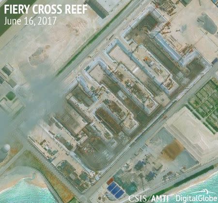 Construction is shown on Fiery Cross Reef, in the Spratly Islands, the disputed South China Sea in this June 16, 2017 satellite image released by CSIS Asia Maritime Transparency Initiative at the Center for Strategic and International Studies (CSIS) to Reuters on June 29, 2017. MANDATORY CREDIT CSIS/AMTI DigitalGlobe/Handout via REUTERS