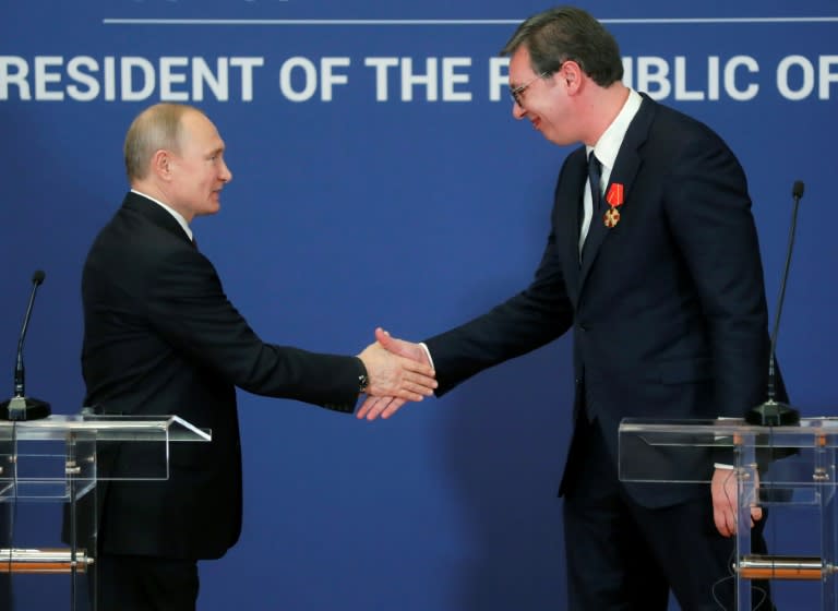 Russian President Vladimir Putin decorated Serbian President Aleksandar Vucic with the Alexander Nevsky Order following a signing ceremony in Belgrade