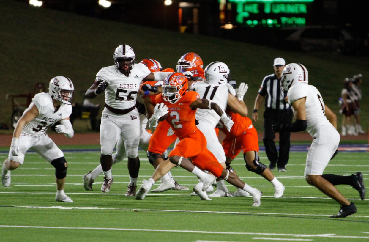 Central's Jayvion Robinson (2) breaks free for a run against Midland Legacy at San Angelo Stadium on Oct. 20, 2023.