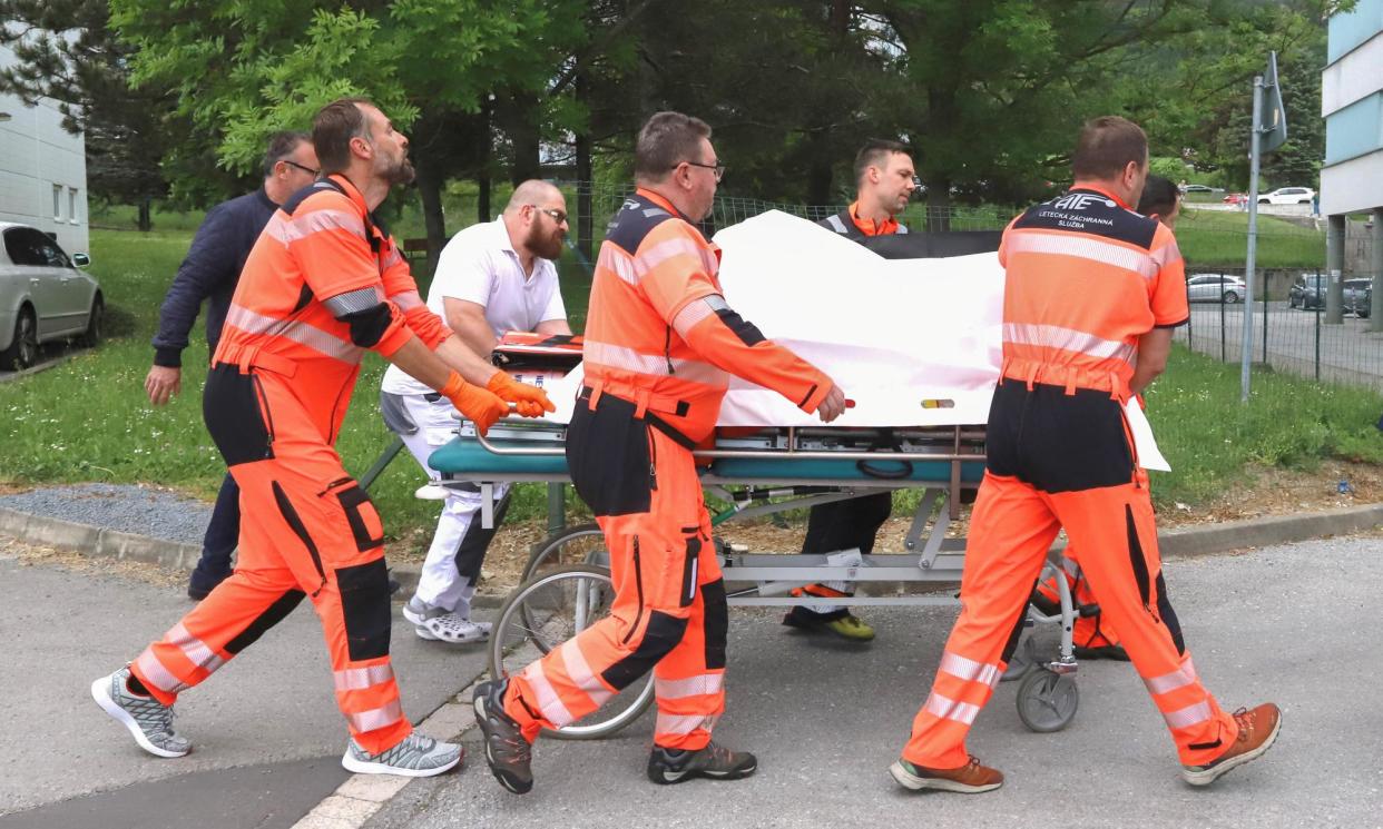 <span>The Slovakian prime minister, Robert Fico, being taken to hospital after the incident in Handlová, Slovakia.</span><span>Photograph: Reuters</span>