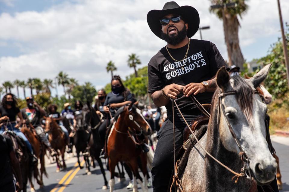 COMPTON, CA - JUNE 07: The Compton Cowboys, with Randy Savvy riding lead, prepare to leave Gateway Towne Center, for the start of their Peace Ride, culminating at Compton City Hall, on Sunday, June 7, 2020. (Jay L. Clendenin / Los Angeles Times via Getty Images)