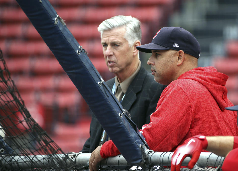 Boston Red Sox President of Baseball Operations Dave Dombrowski, left, and Red Sox manager Alex Cora watch during a baseball workout at Fenway Park, Thursday, Oct. 4, 2018, in Boston, in preparation for Game 1 of the ALDS against the New York Yankees on Friday. (AP Photo/Elise Amendola)