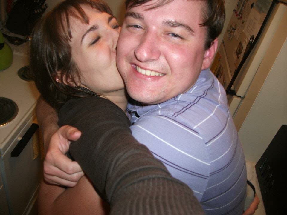 My husband and I got married at the young ages of 21 and 23. We were so young, so stupid, so broke and so very in love. This is us in our tiny first kitchen, barely any room for one person, where we would sit and eat and talk late into the night. This picture captures how happy we were with so little to our name. --<i>&nbsp;Melanie B.</i>