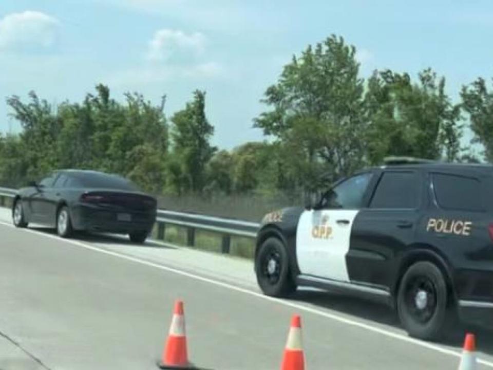 OPP say the area is cleared after an active investigation on Highway 401 on Friday. (Jacob Barker/CBC - image credit)